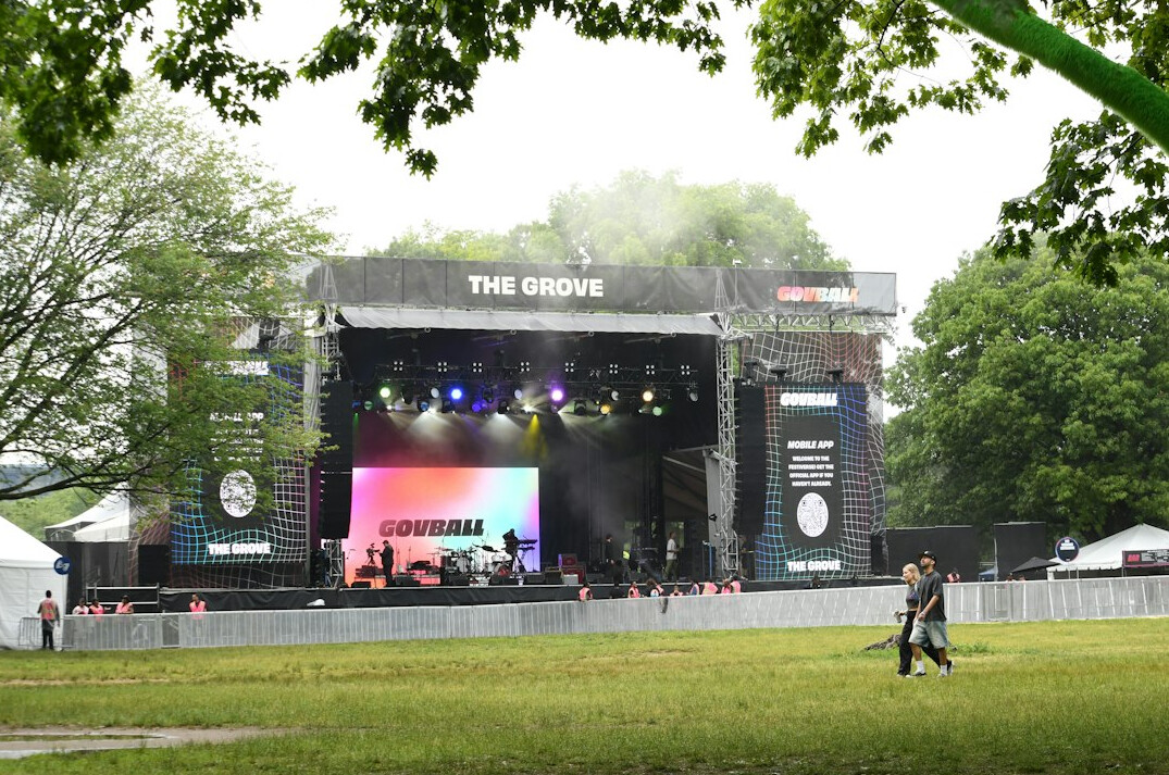 Live event stage with lighting and screens