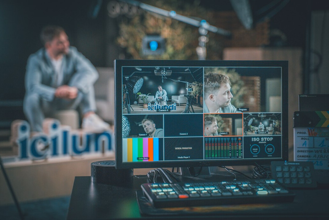 Wall of preview monitors in a live production gallery