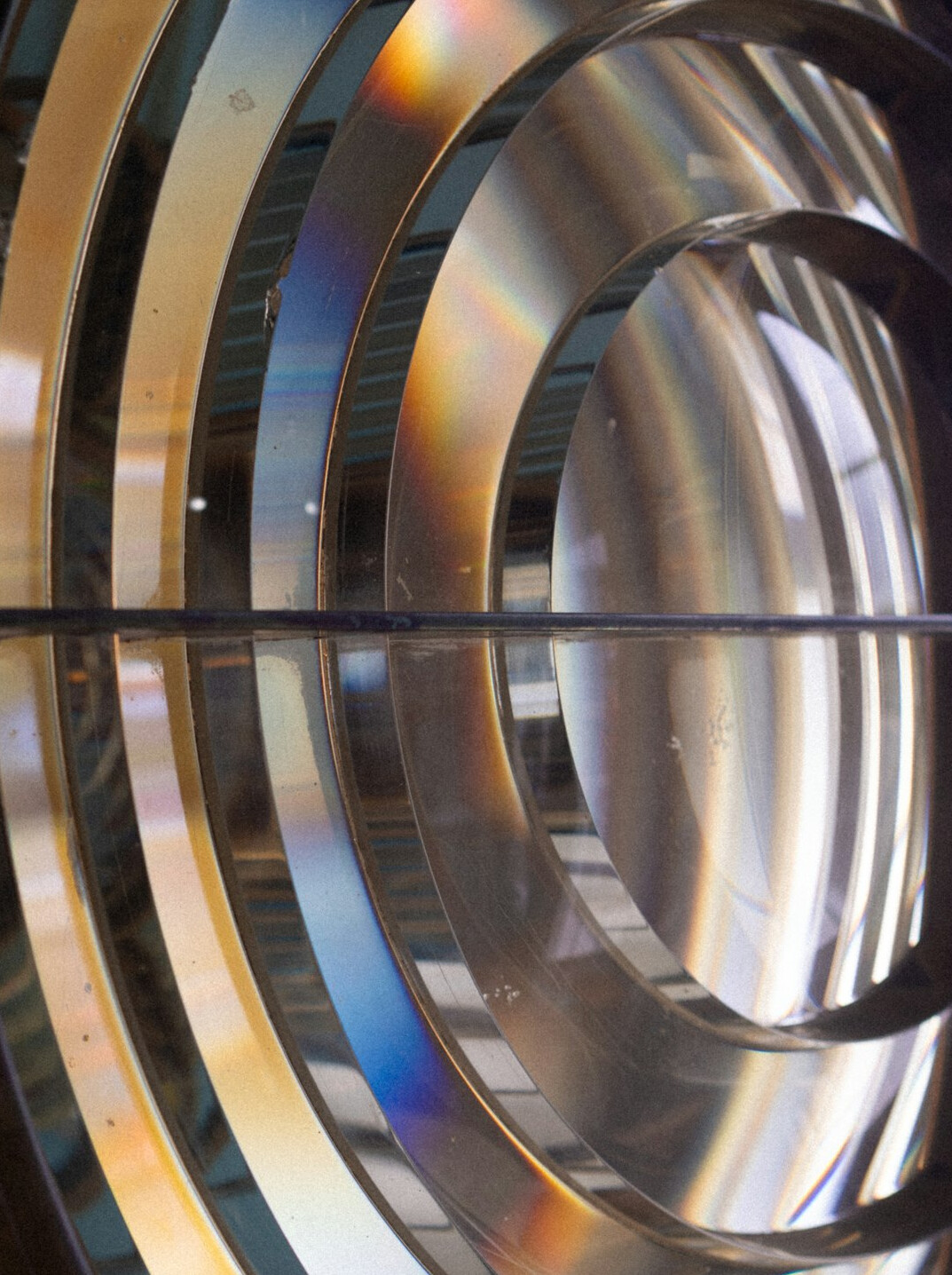Broadcast camera lens close-up with reflections